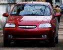 Chevrolet Aveo (T200), красный хэтчбек, вид спереди